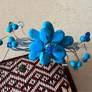 Handmade in Bangkok turquoise and blue beaded floral bracelet.